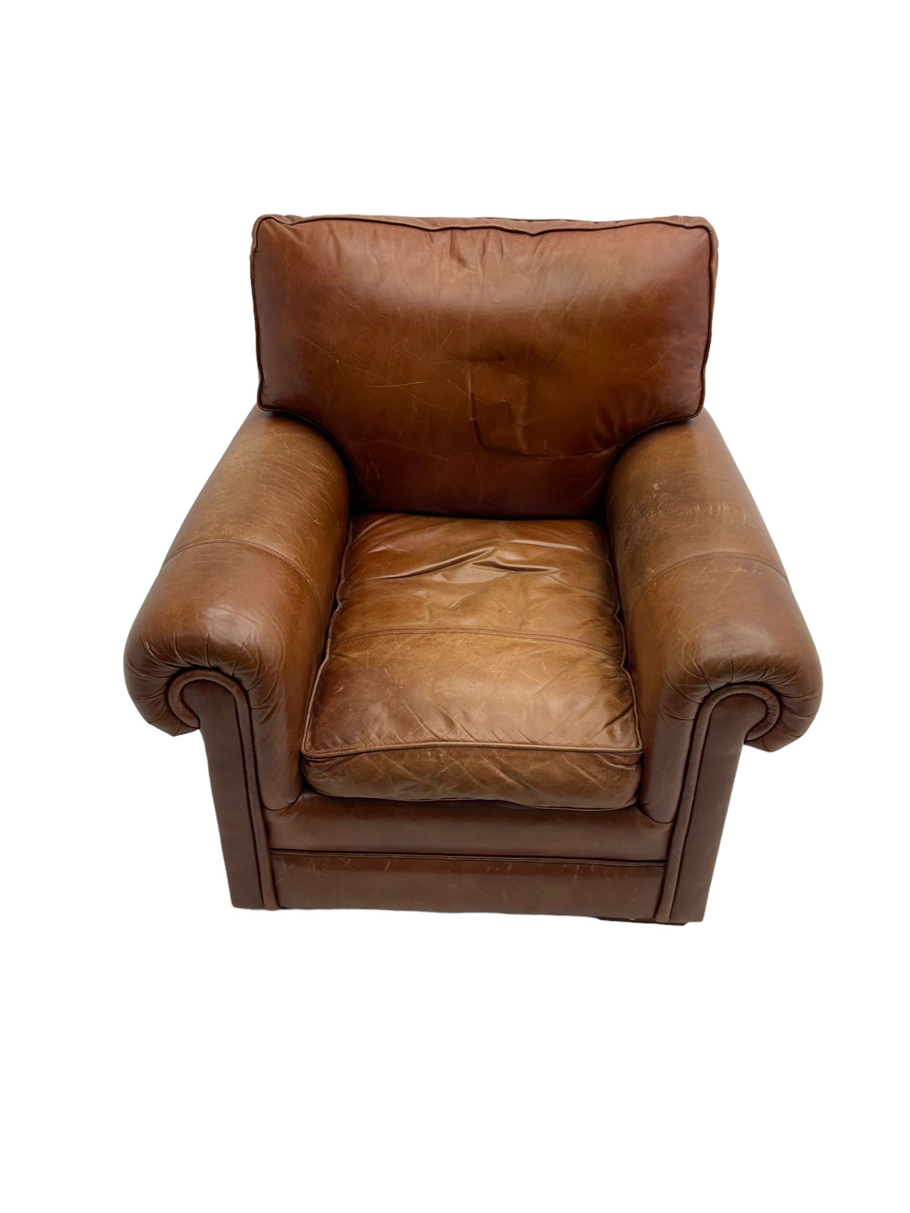 Large two seat sofa upholstered in tan 'Derwent' leather (W200cm D100cm H85cm), and matching armchair (W95cm)