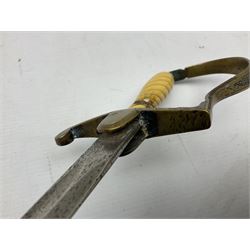 1900-1918 German Imperial NCO sabre with WW2 modifications of Wehrmacht insignia to the langet, 79cm slightly curving fullered blade and brass hilt, the knucklebow chased with oak leaves and acorns L90.5cm overall
This item has been registered for sale under Section 10 of the APHA Ivory Act 