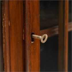 Late 19th century mahogany bookcase, fitted with two drawers over twin astragal glazed doors, enclosing three adjustable shelves, on bracket feet