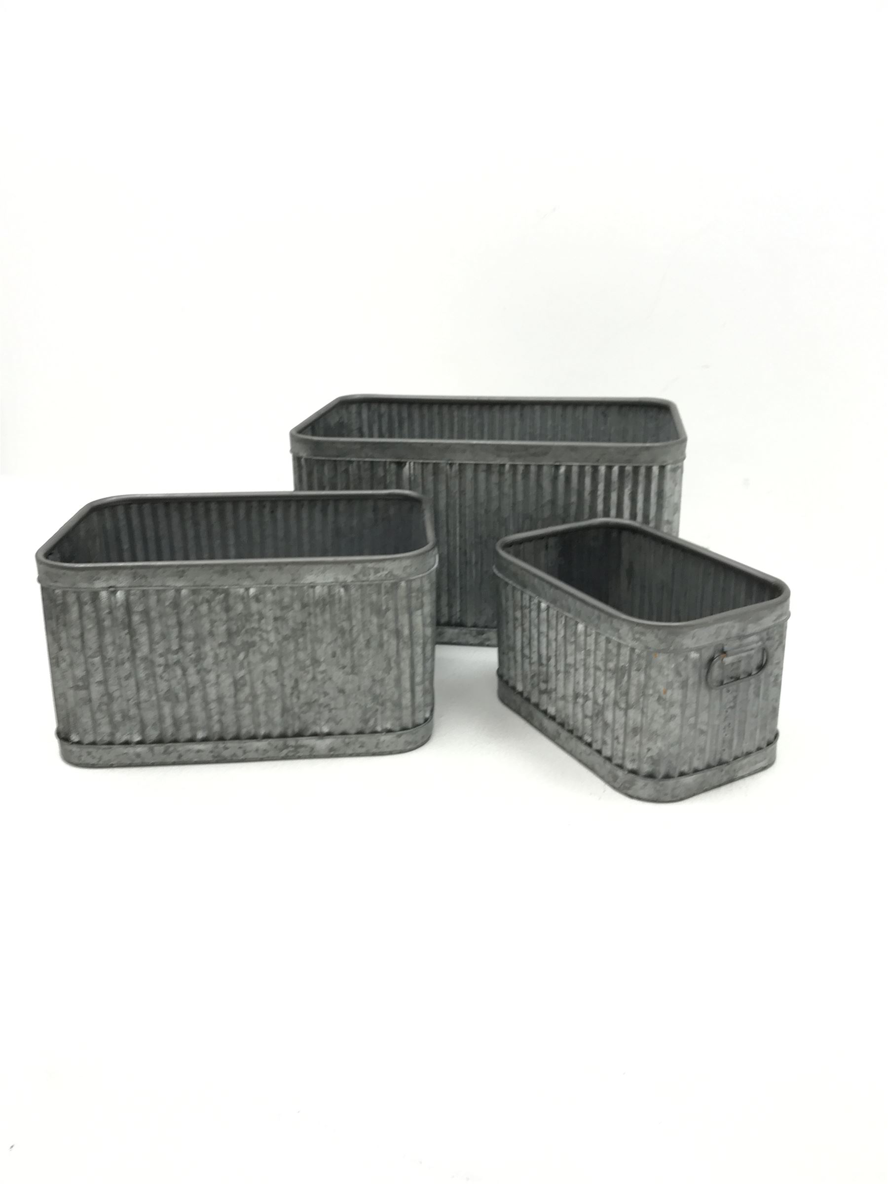 Set of three graduating galvanised tubs (max measurements)