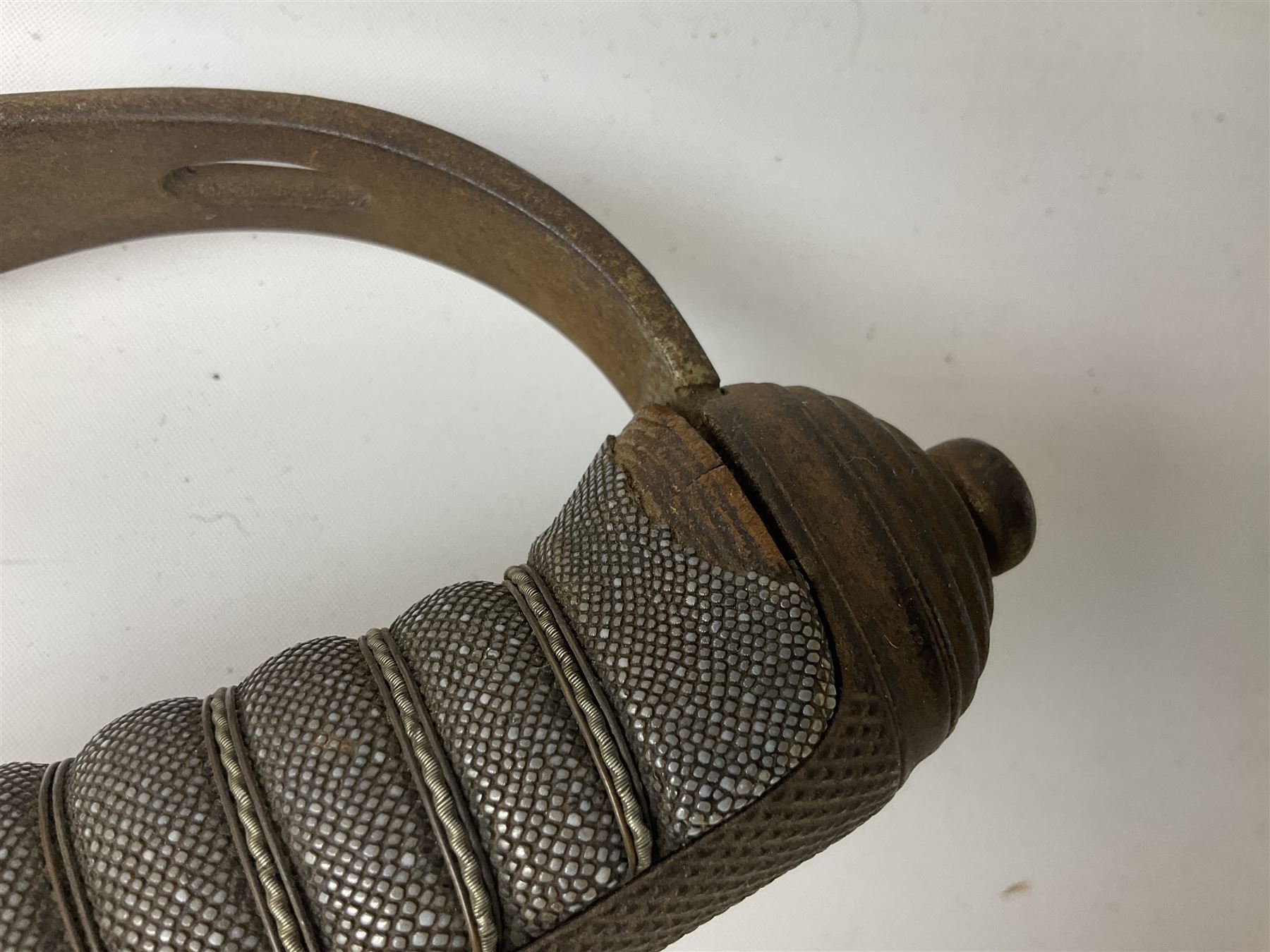 Victorian artillery officer's sword, the 90cm fullered steel blade by E. Thurkle Denmark Street Soho London decorated with Victoria cypher, Regimental crest and 'Royal Artillery', three-bar hilt with stepped pommel and wire-bound fish skin grip; in leather covered scabbard L107cm overall