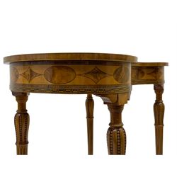 Fine 20th century satinwood kidney-shaped lamp or side table, the top inlaid with central figured panel surrounded by trailing fruiting foliage and ribbon tie, within crossbanding and stringing, fitted with single frieze drawer, the frieze rail inlaid with alternating figured geometric panels, on ring turned supports carved with vertical bead decoration over inlaid fluting, united by curved stretchers 