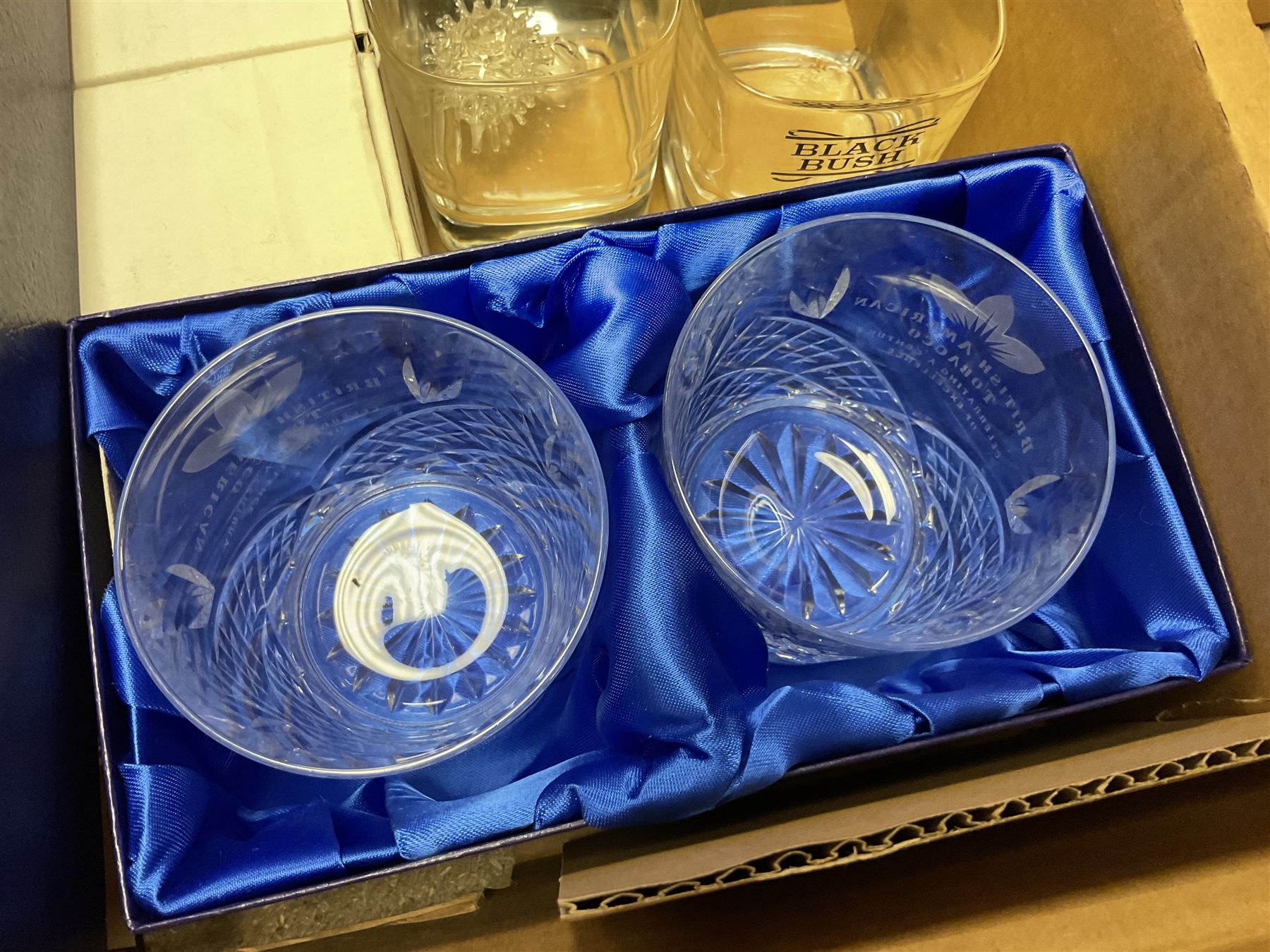 Caithness 'Fireball' paperweight, together with four cased Tyrone Crystal glasses, glass oil lamp, three glass decanters etc, in two boxes