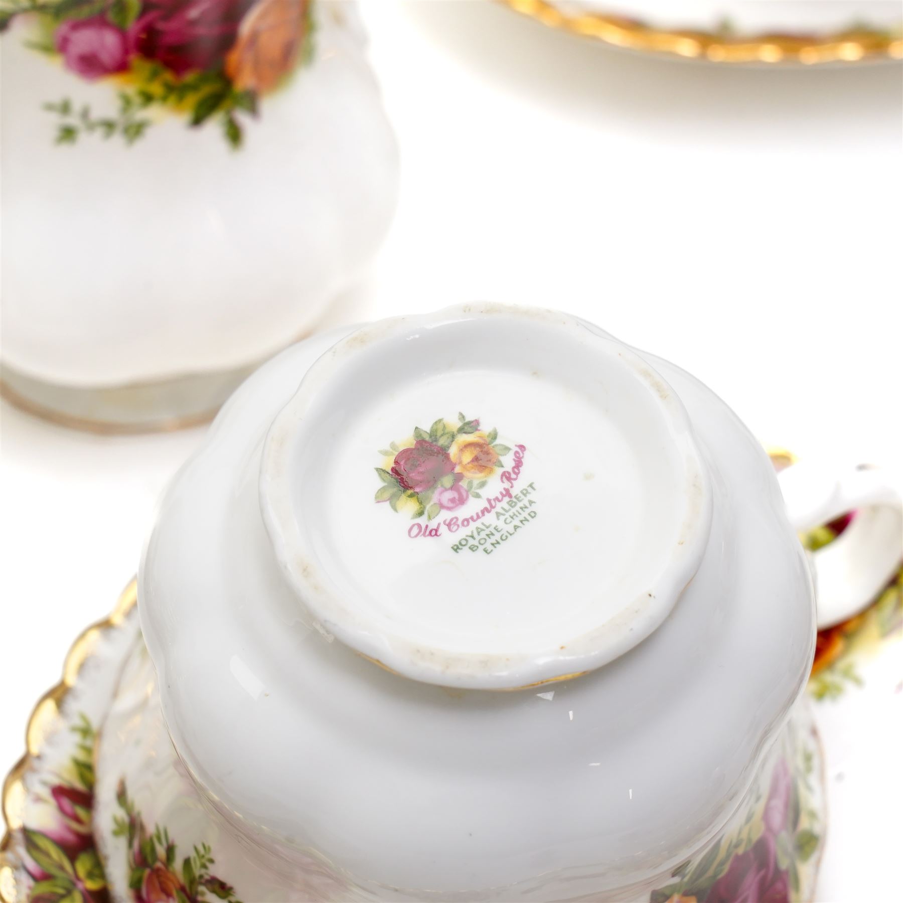 Royal Albert Old Country Roses tea and dinner ware comprising six dinner plates, five dessert bowls, sauce boat and stand, four breakfast cups and saucers, three tea cups and four saucers, six tea plates, milk jug, sugar bowl and bread and butter plate