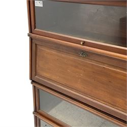 Globe Wernicke - early 20th century mahogany four-tier stacking library bookcase, three glazed sections enclosed by hinged and sliding doors, fall front section with fitted interior, with transfer label 