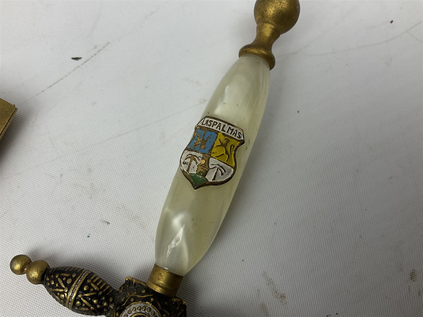 Malayan Kris dagger, the 31.5cm double edged straight heavy damascus blade with copper ferrule; carved hardwood grip; in large wooden throated scabbard with floral decorated white metal covering L47.5cm overall; a kris blade with adapted antler grip; and five various small daggers/letter openers (7)