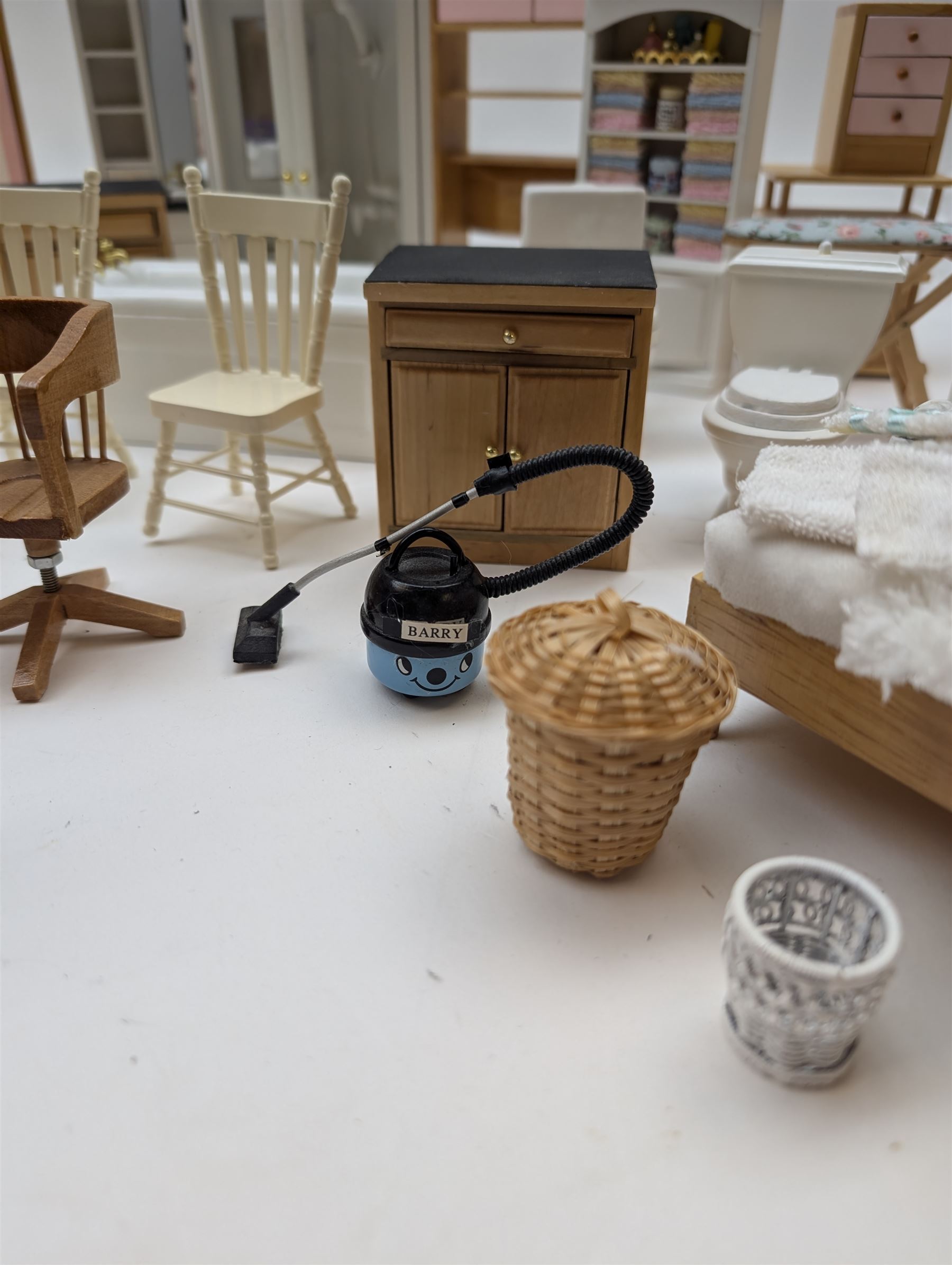 Modern 1:12 scale dolls house furniture, comprising pine kitchen set, with wall cabinets, floor cabinets and sink unit, white wooden bathroom suite, white wooden kitchen and dining room furniture and appliances, wooden bedroom furniture, Raine purple wingback chair, tv, desk, fish tank, etc