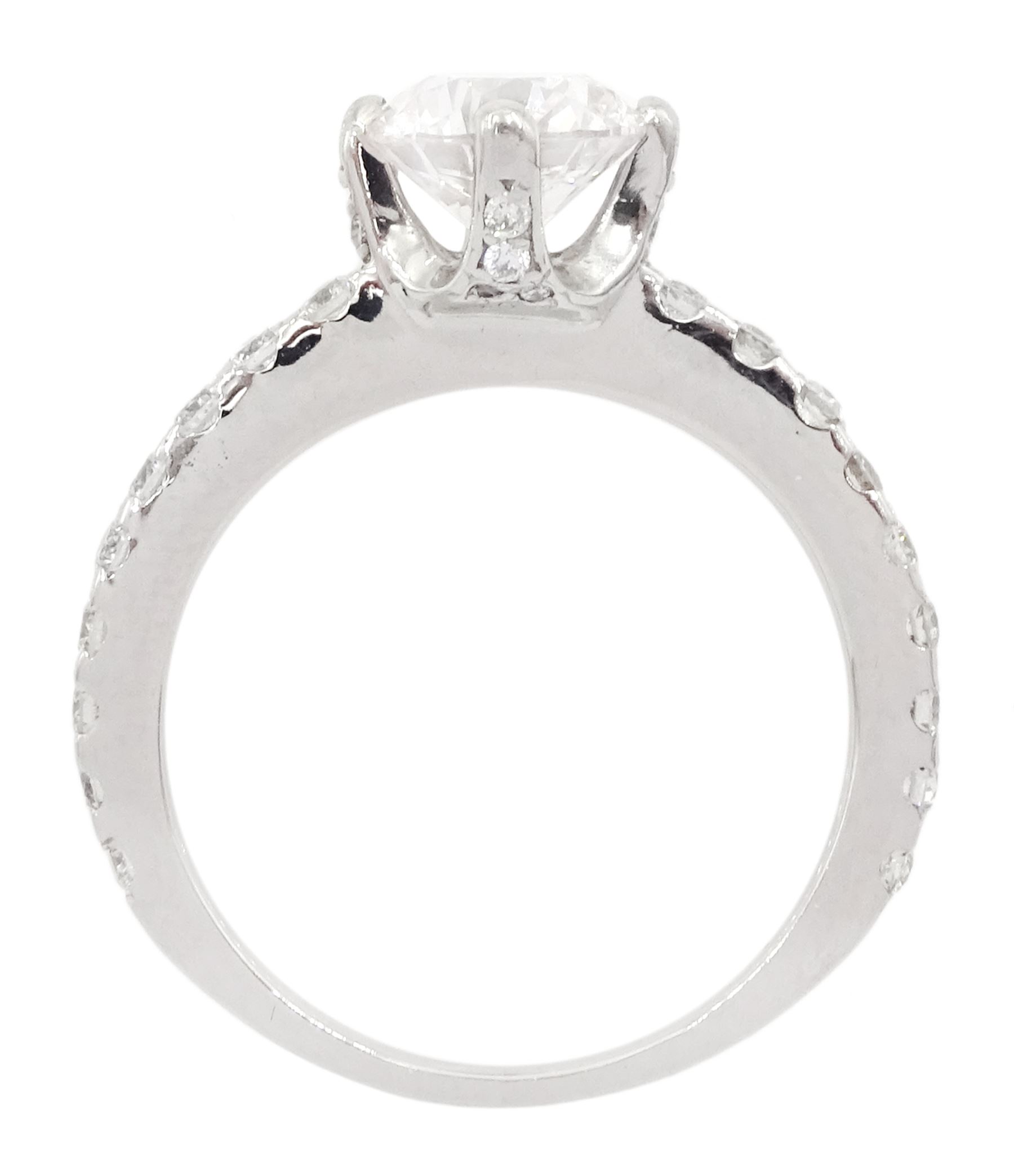 Platinum single stone round brilliant cut diamond ring, with diamond set shoulders and diamond set gallery, principal diamond approx 1.00 carat