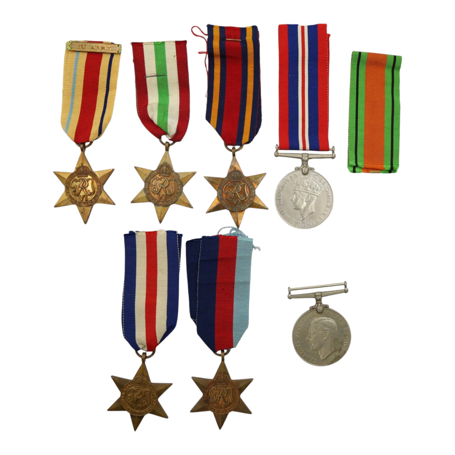 WWII British medals, comprising War medal, Defence medal, 1939-1945 Star, Burma Star, France and Germany Star, Italy Star and Africa Star 1st Army