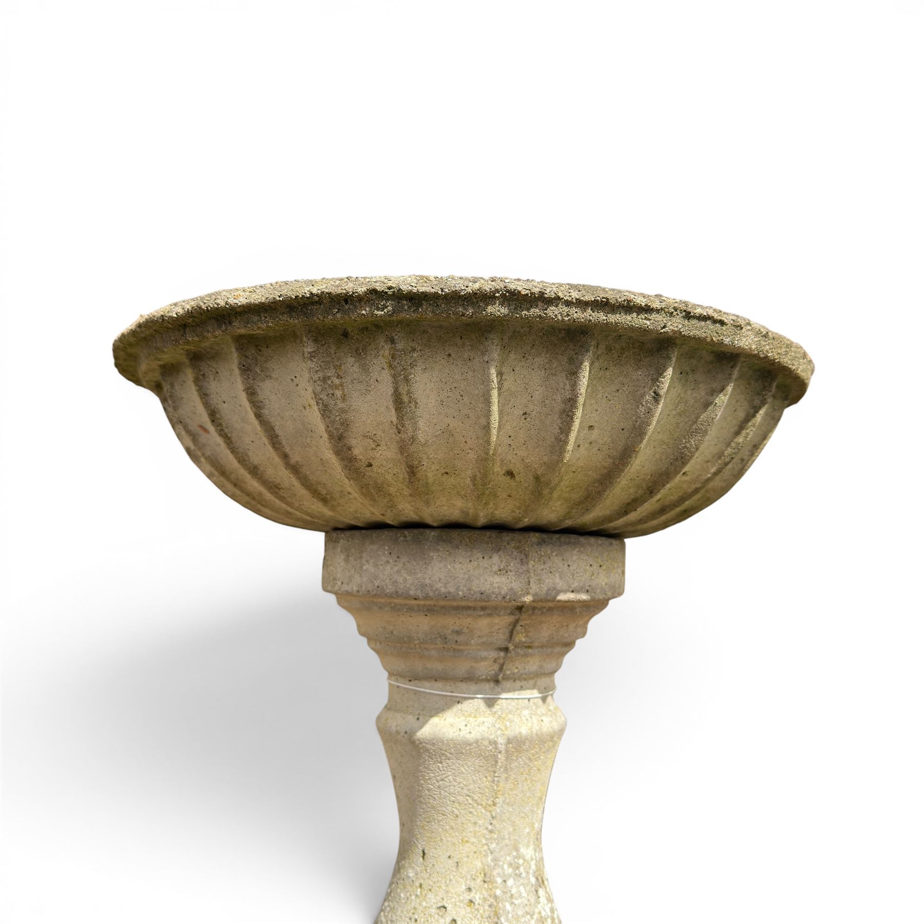 Large cast stone bird bath, circular bowl on spiral column; and a small three piece bird bath (2)