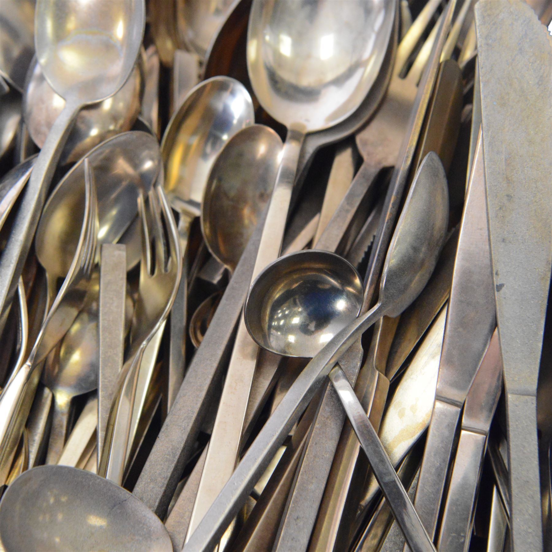 Quantity of bronzed cutlery, in the manner of Sigvard Bernadotte, stamped Scanline
