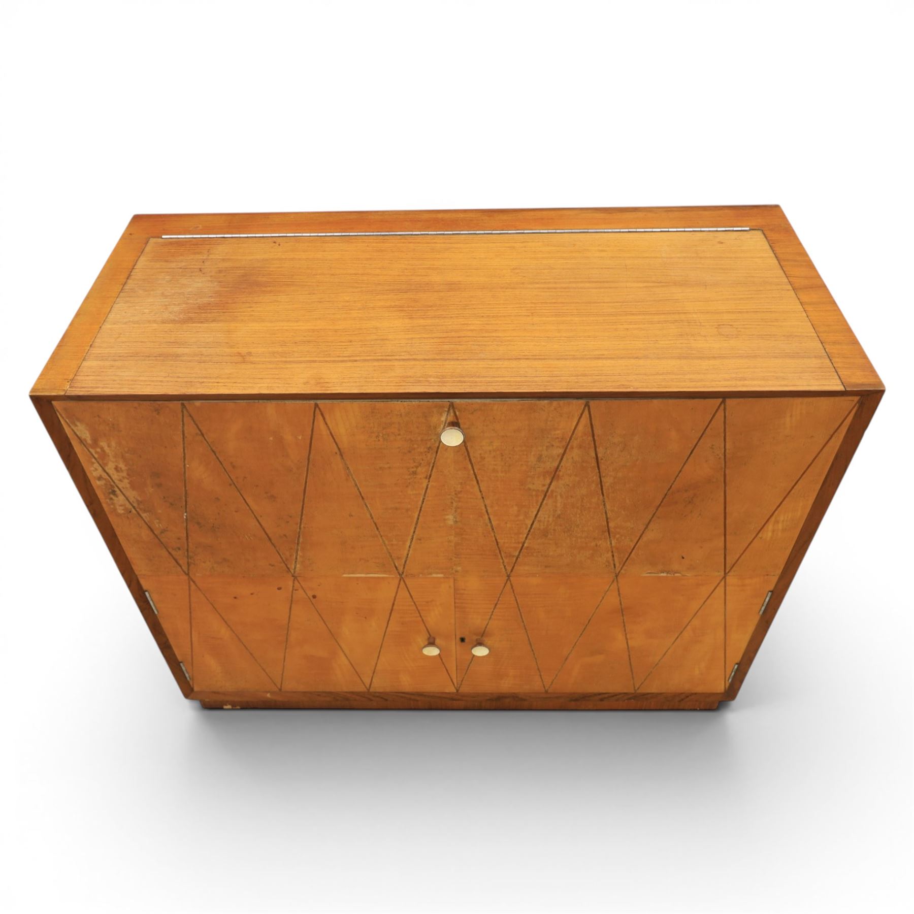 Teak mid 20th century fall front cabinet, hinged top with geometric inlay front, above twin cabinet doors
