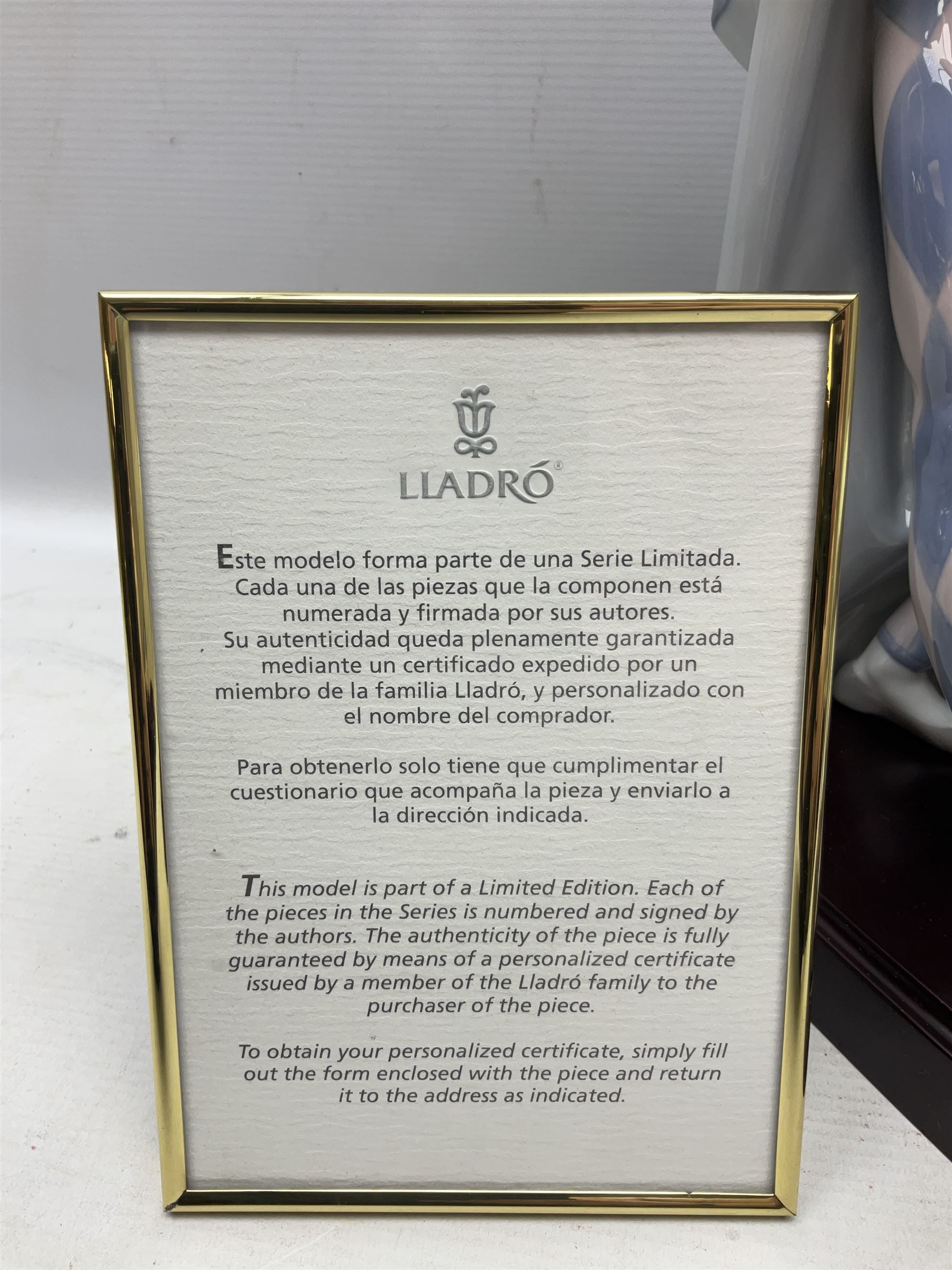 Lladro figure, Jester Serenade, modelled as a ballerina with bouquet of flowers seated before a jester playing the violin, limited edition 2541/3000, sculpted by Antonio Ramos, no 5932, with original box, year issued 1993, year retired 1994, H37cm