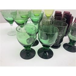 Set of four Swedish Reijmyre drinking glasses, with textured outer surface, together with green drinking glasses including Holmegaard examples and other glassware