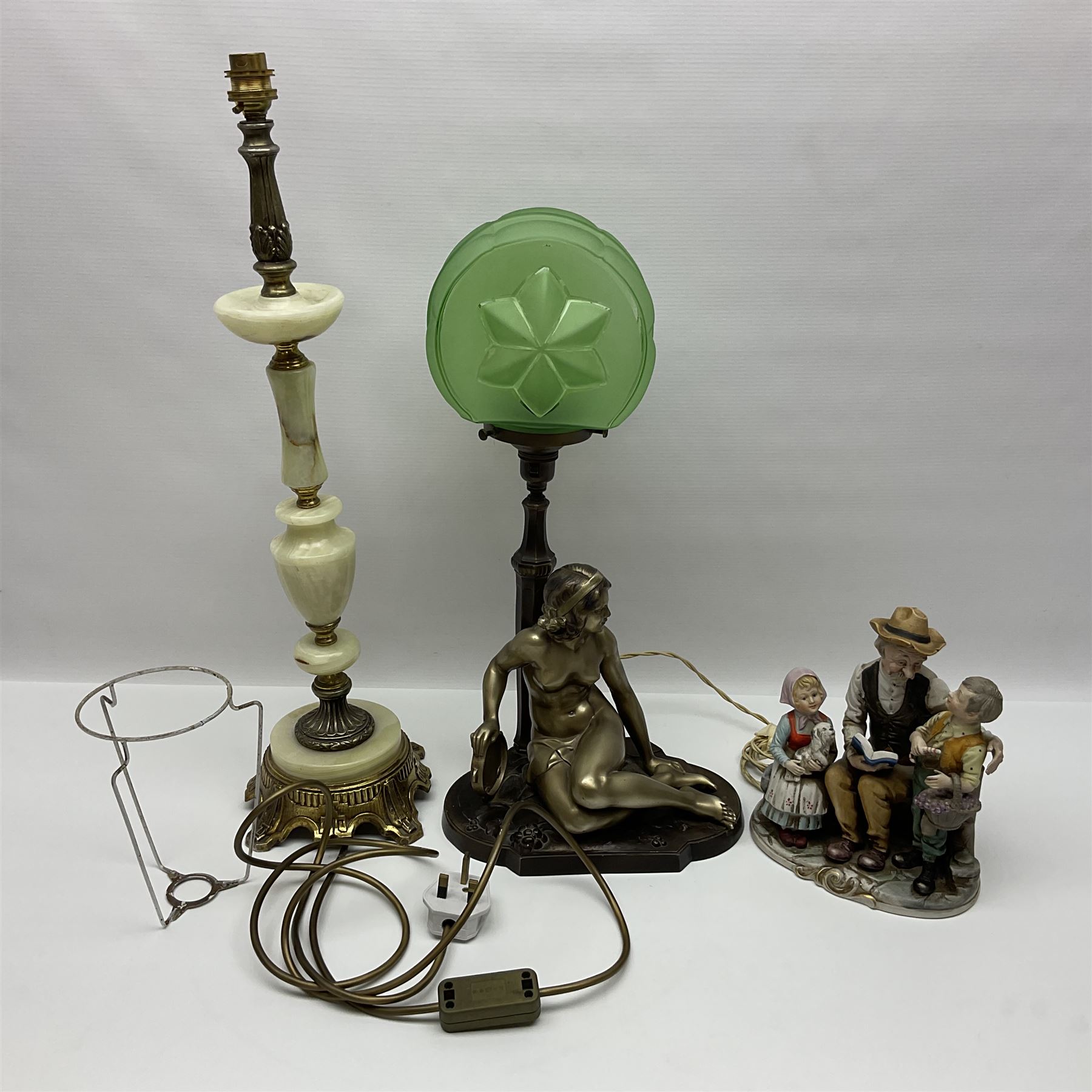 Art Deco style bronzed and gilded spelter figural table lamp with green Uranium glass shade; H48cm, another table lamp; and a bisque group