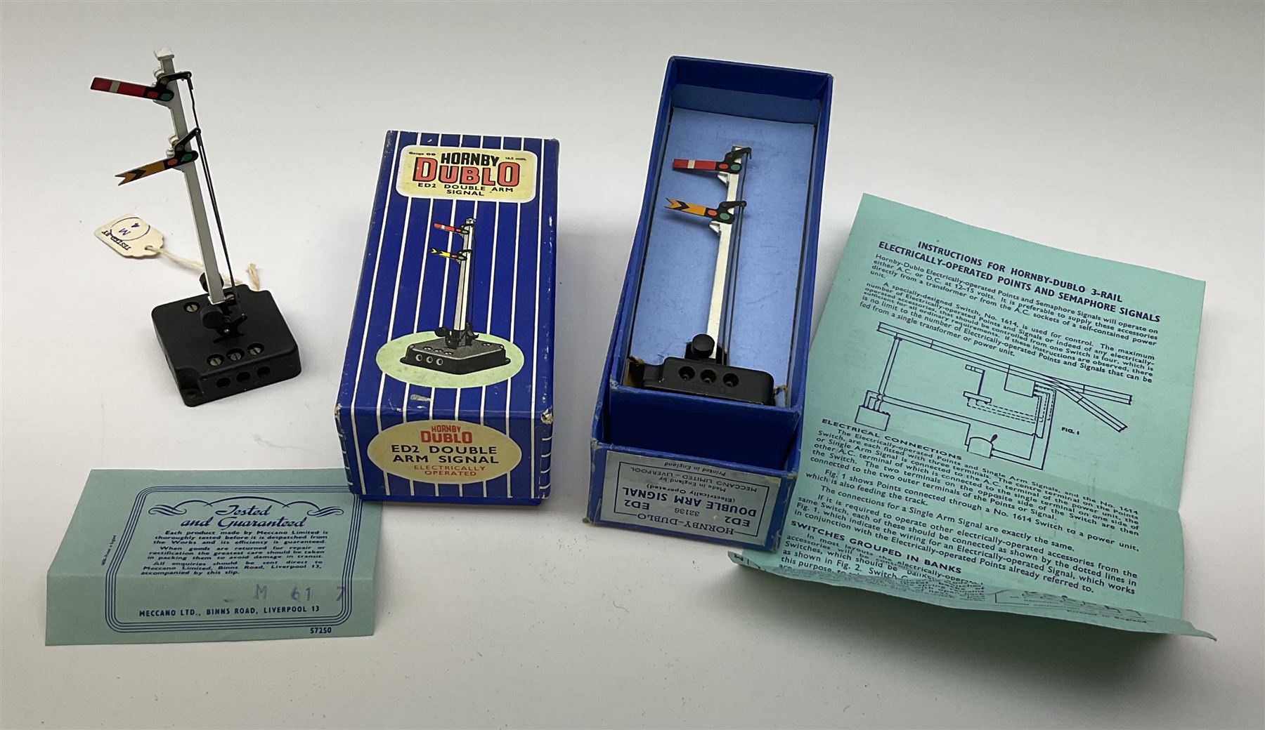 Hornby Dublo - twelve electric semaphore signals comprising four ED1 Single Arm; two ED2 Double Arm; one ED3 Junction Signal Upper Quadrant; one 5045 Colour Light Signal - Single (Home); two ES6 Colour Light Signal -Single (Distant); and two 5047 Colour Light Signal - Junction (Home); all boxed (12)
