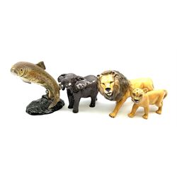 Collection of Beswick figures, comprising trout model no 1032, elephant model no 974, lion model no 2089, and lion cub model no 2098.