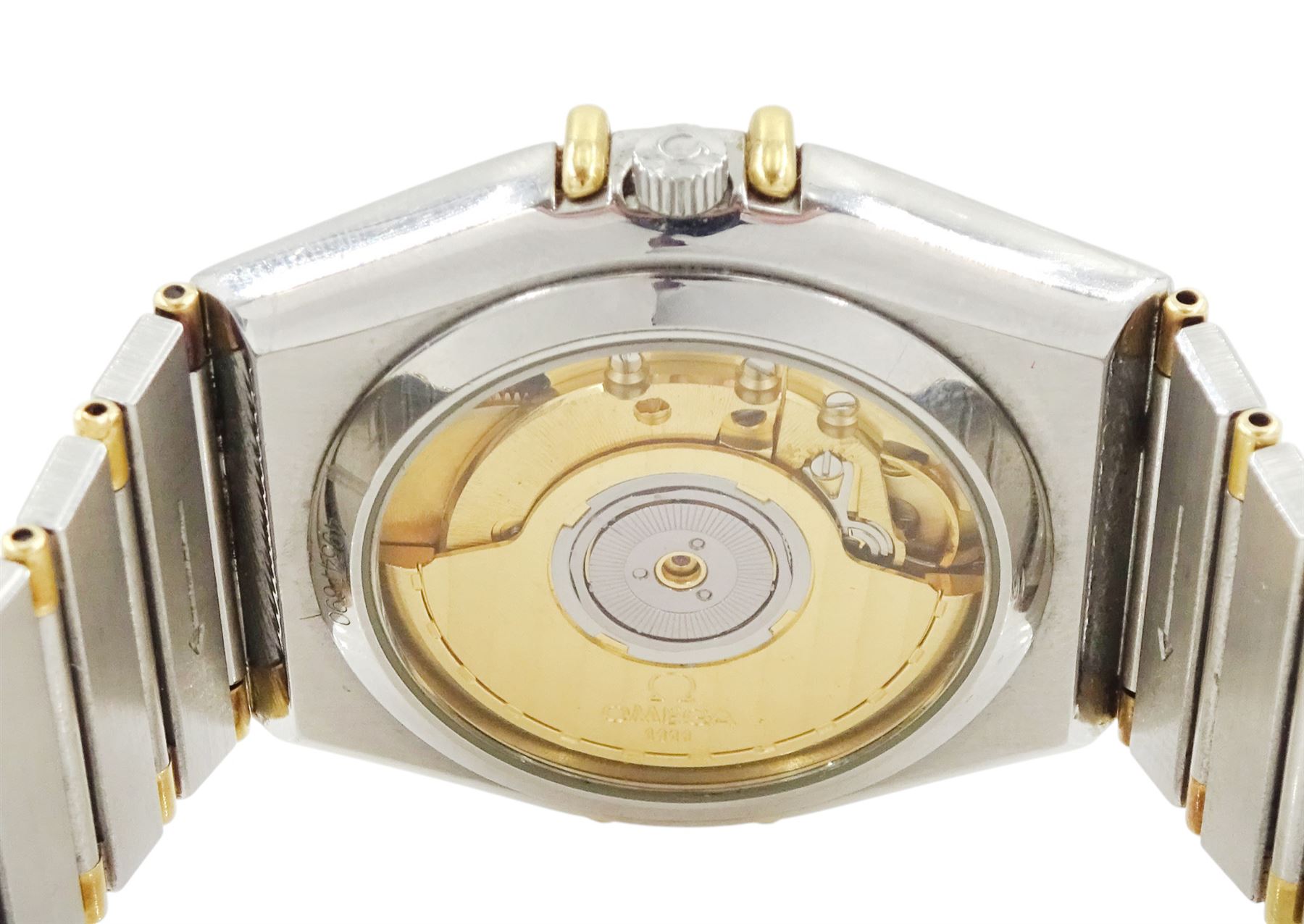 Omega Constellation gentleman's stainless steel and gold automatic chronometer wristwatch, Ref. Cal. 1111, serial No. 49547890, white dial with date aperture and exhibition back case, on integral bracelet No. 1448.5/431, with fold-over clasp
