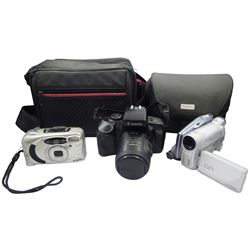 Assorted cameras to include a Canon EOS 700 SLR camera with Canon Zoom Lens 35-80mm, Canon DC100 DVD Camcorder, Bell + Howell PZ2200 Camera, with two camera bags. 
