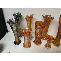 Collection of carnival glass trumpet vases and similar, largest H32cm