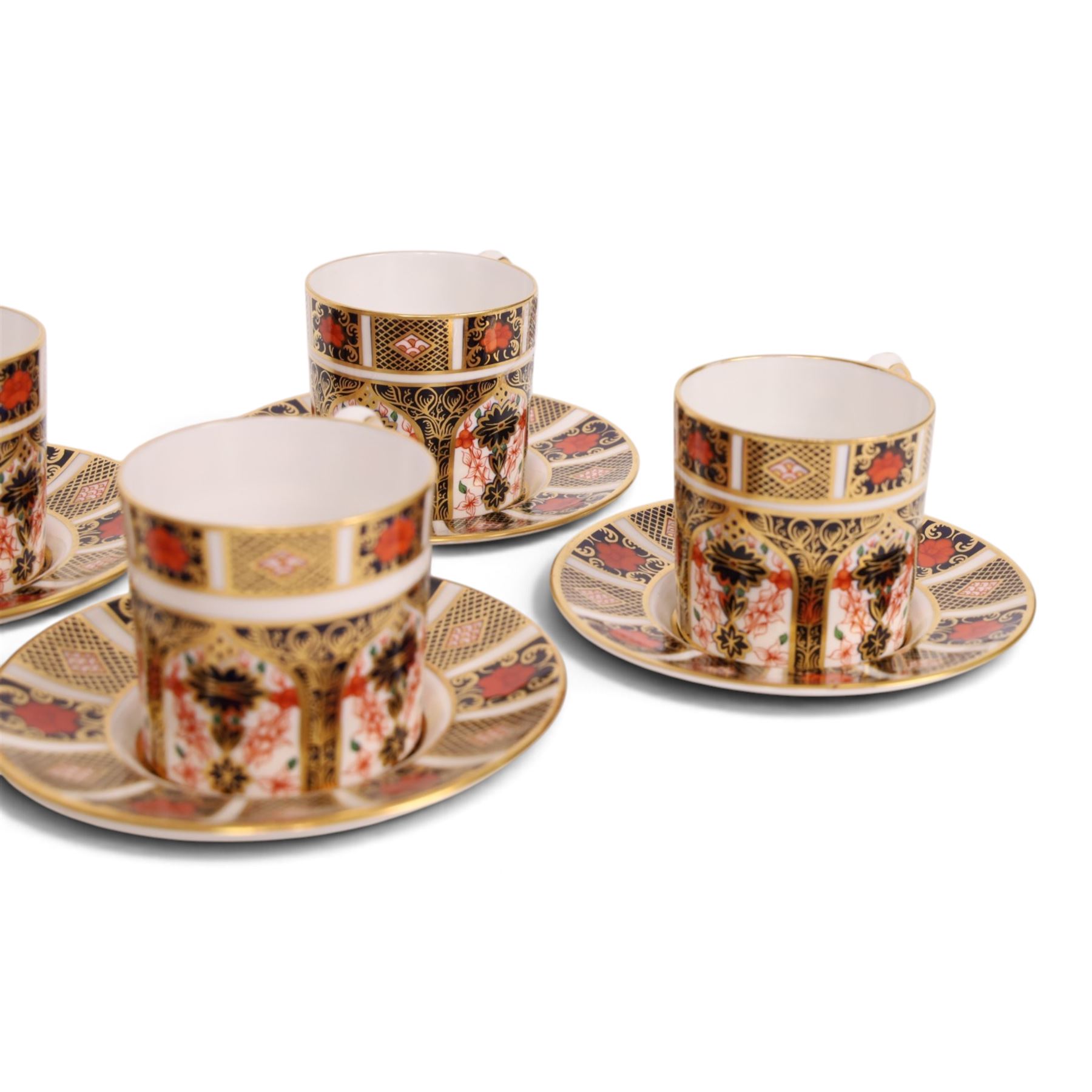Eight Royal Crown Derby Old Imari 1128 pattern coffee cans and saucers