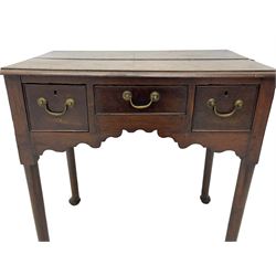 18th century oak low-boy, ovolo-moulded rectangular top over three cock-beaded drawers, circular brass handle plates and D-shaped handles, shaped and stepped arched apron, on cabriole supports 