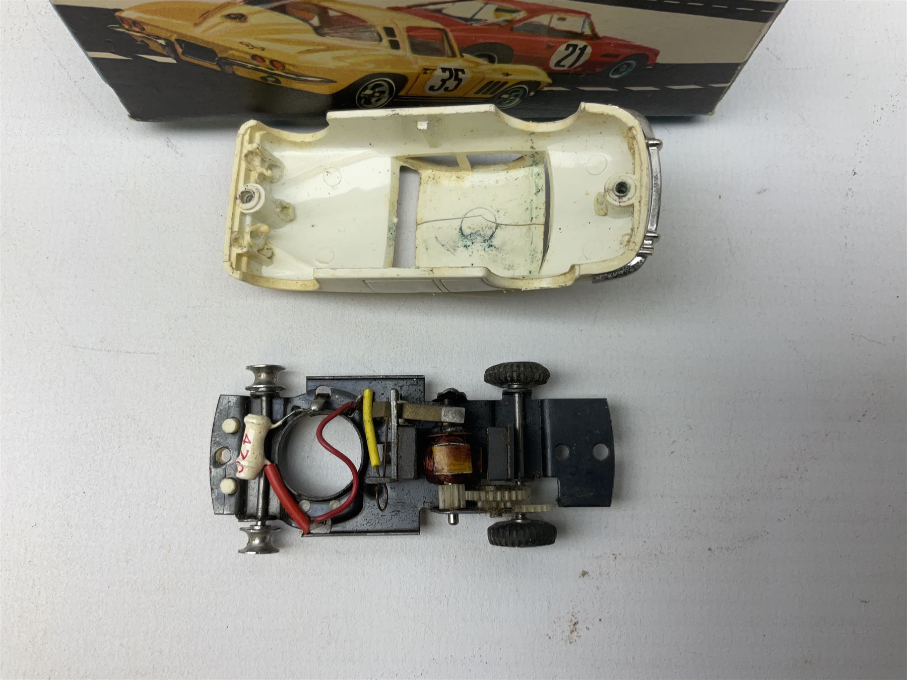 Various makers - Tri-ang Mini-Hi-Way Racing Car Series Le Mans No.9 racing car; Matchbox K-15 Merryweather Fire-Engine; Marx tin-plate Friction Helicopter; all boxed; and a Minic Motor Rally Adventure box containing a Jaguar Police car for spares or repair (4)