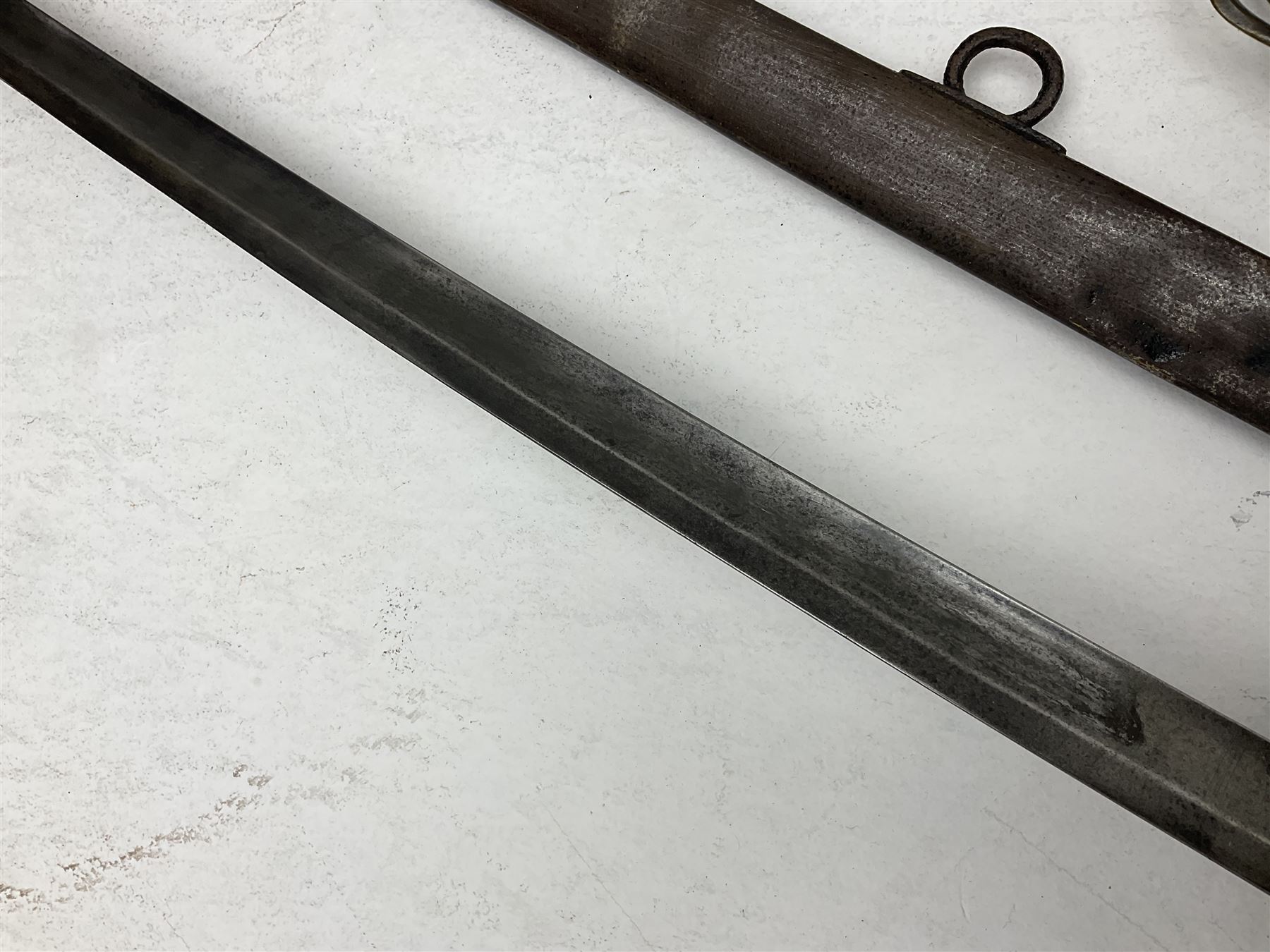 19th century Imperial German army heavy cavalry officers sword by Schnitzler and Kirschbaum, with 89cm single fullered steel blade and sheet steel basket hilt with teardrop cut-out and wire-bound leather grip L107.5cm overall; in steel scabbard with two suspension rings; and British Army 1822 Pattern Infantry Officer's sword in associated scabbard (2)