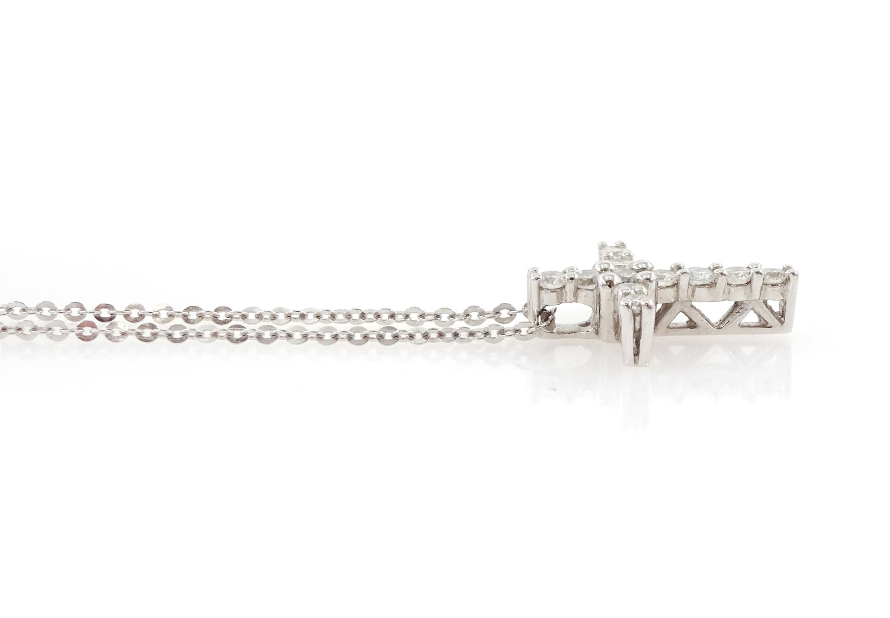 18ct white gold diamond cross pendant necklace, the cross pendant set with eleven round brilliant cut diamonds of approx 0.20 carat, on a trace link chain necklace