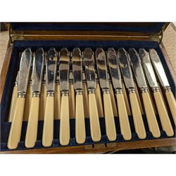 Three cased canteens of cutlery, including King's pattern set and two ivorine handled sets