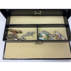 Collection of costume jewellery including brooches, beaded necklaces, wristwatches, earrings and hatpins in a leather jewellery box, and a glass scent bottle, pens etc 