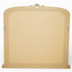 Regency style gilt overmantle mirror, arched rectangular frame with moulded surround, surmounted by a central anthemion and scrolling foliate crest, the frame enriched with beaded and foliate mouldings, the lower corners with applied scroll terminals, enclosing a single rectangular mirror plate