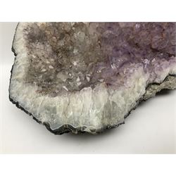 Amethyst crystal geode cluster, with well-defined crystals of various sizes, H13cm, L46cm