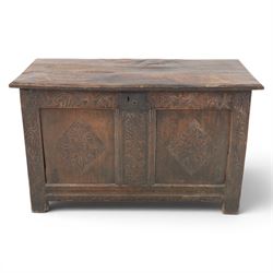 18th century oak coffer with carved frieze and rails, rectangular plank top with iron stra...