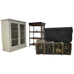 20th century painted side cabinet, enclosed by lead glazed doors (W75cm, H91cm, D37cm); early 20th century four tier stand; metal travelling trunk initialled 'J.E.P.'; 20th century wood and canvas bound travelling trunk (4)