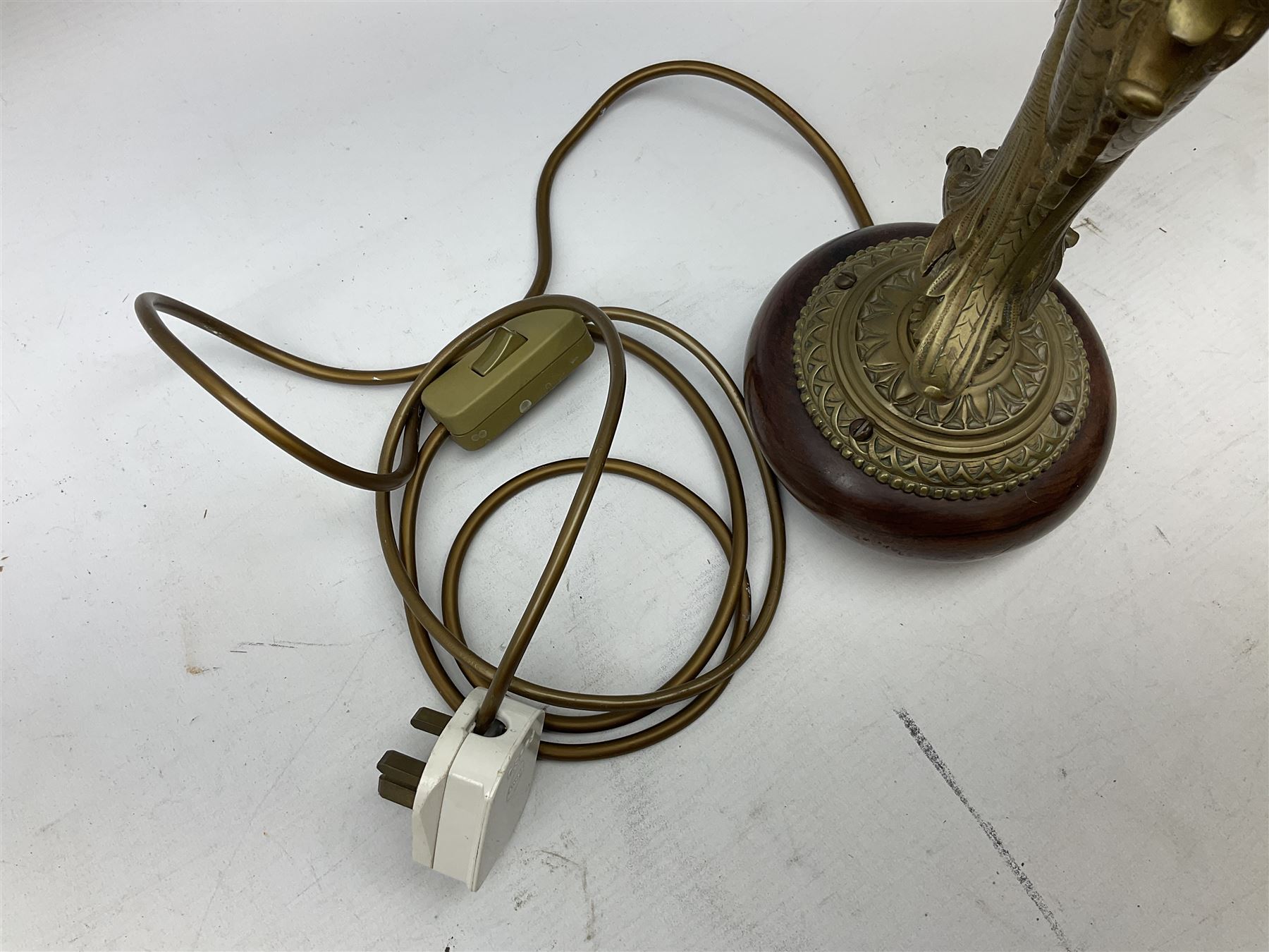 Victorian gilt bronze converted gas lamp in the form of  mythical winged mermaid upon a circular oak base, with a frilled green glass shade, H44cm