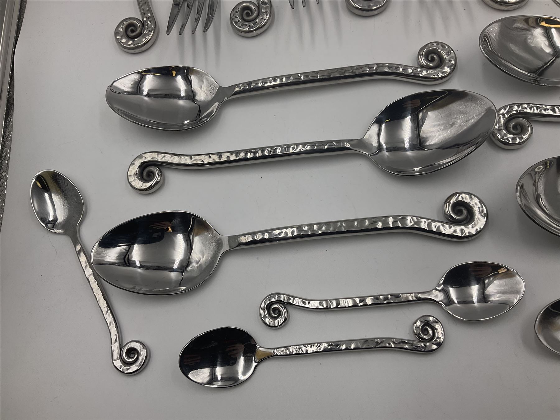 Artisan 24 piece stainless steel cutlery set in the Hammered Shell pattern