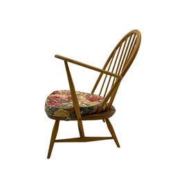 Ercol - beech low easy armchair, with upholstered loose cushion in floral patterned fabric 