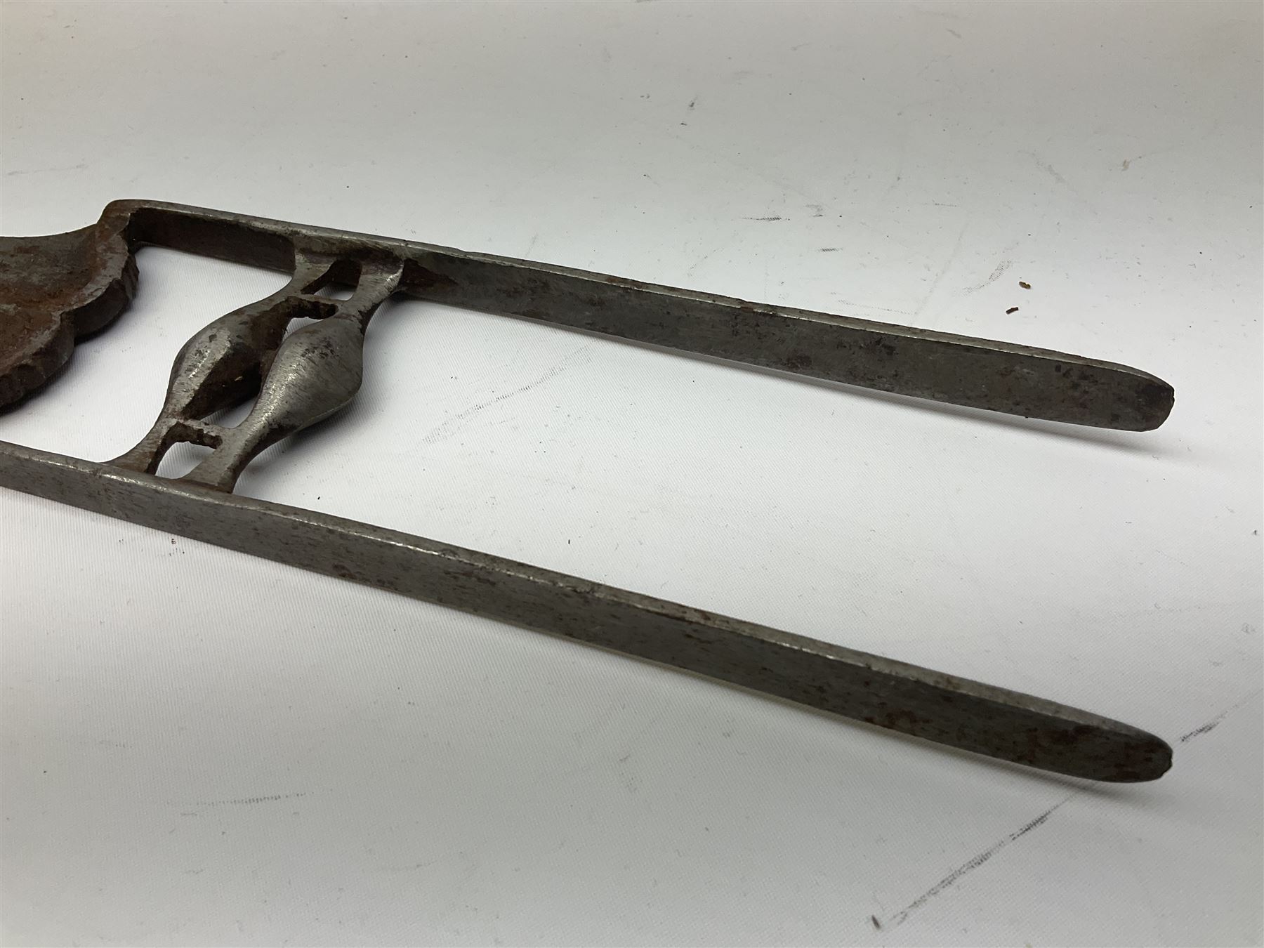 Indian thrusting dagger Katar the 25cm blade with swollen point and central rib, in leather covered wooden sheath L45cm overall