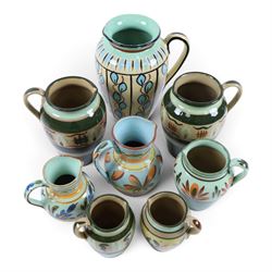 Eight Hartrox and Dee Cee Stoneware jugs, all with floral and abrstact decoration, with printed marks beneath, tallest H24cm
