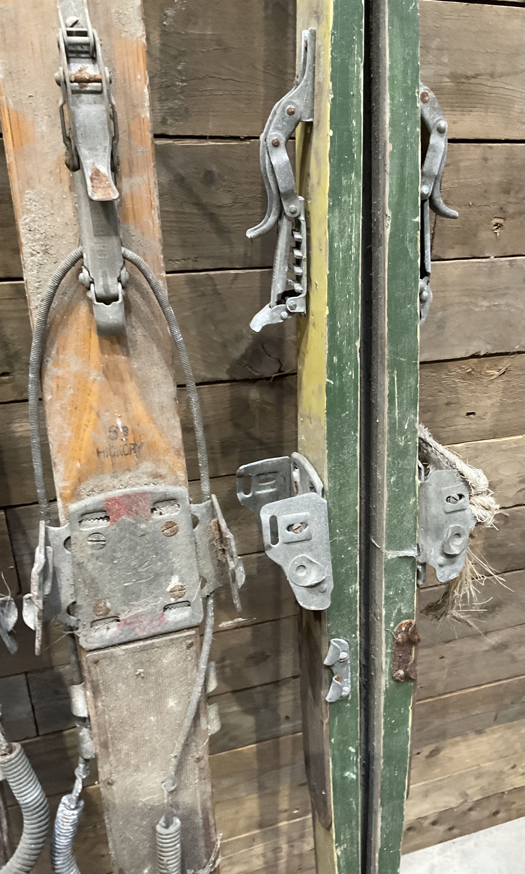 Two pairs of vintage skis, L207cm and 197cm