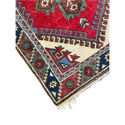 Turkish red ground runner, seven star and leaf decorated medallions, geometric design repeating border