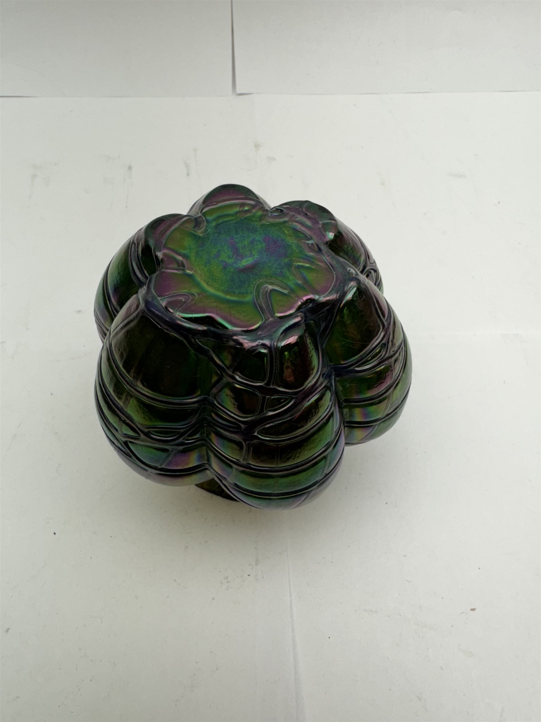 Three Austrian Art Nouveau Kralik iridescent glass vases, to include two of squat baluster form and a taller example, all green with threaded vein decoration to body, tallest H13.5cm