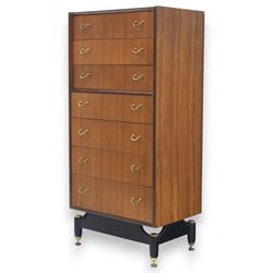 G Plan - 'Librenza' tola wood chest of seven drawers, gold coloured metal pulls on an ebonised based with gold coloured feet