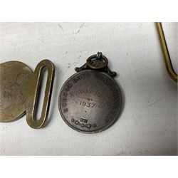 Miscellaneous militaria including two Royal Artillery and one Royal Horse Artillery stable belts; Northamptonshire Regiment trench art brass shell case lighter; unused Matchless Fire-Set; pocket knives and multi-tool; lanyards; oak shield with York & Lancaster crest etc