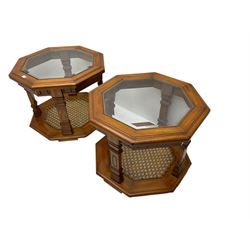 Pair hardwood octagonal side tables, moulded top with bevelled glass inset, cane work undertier 