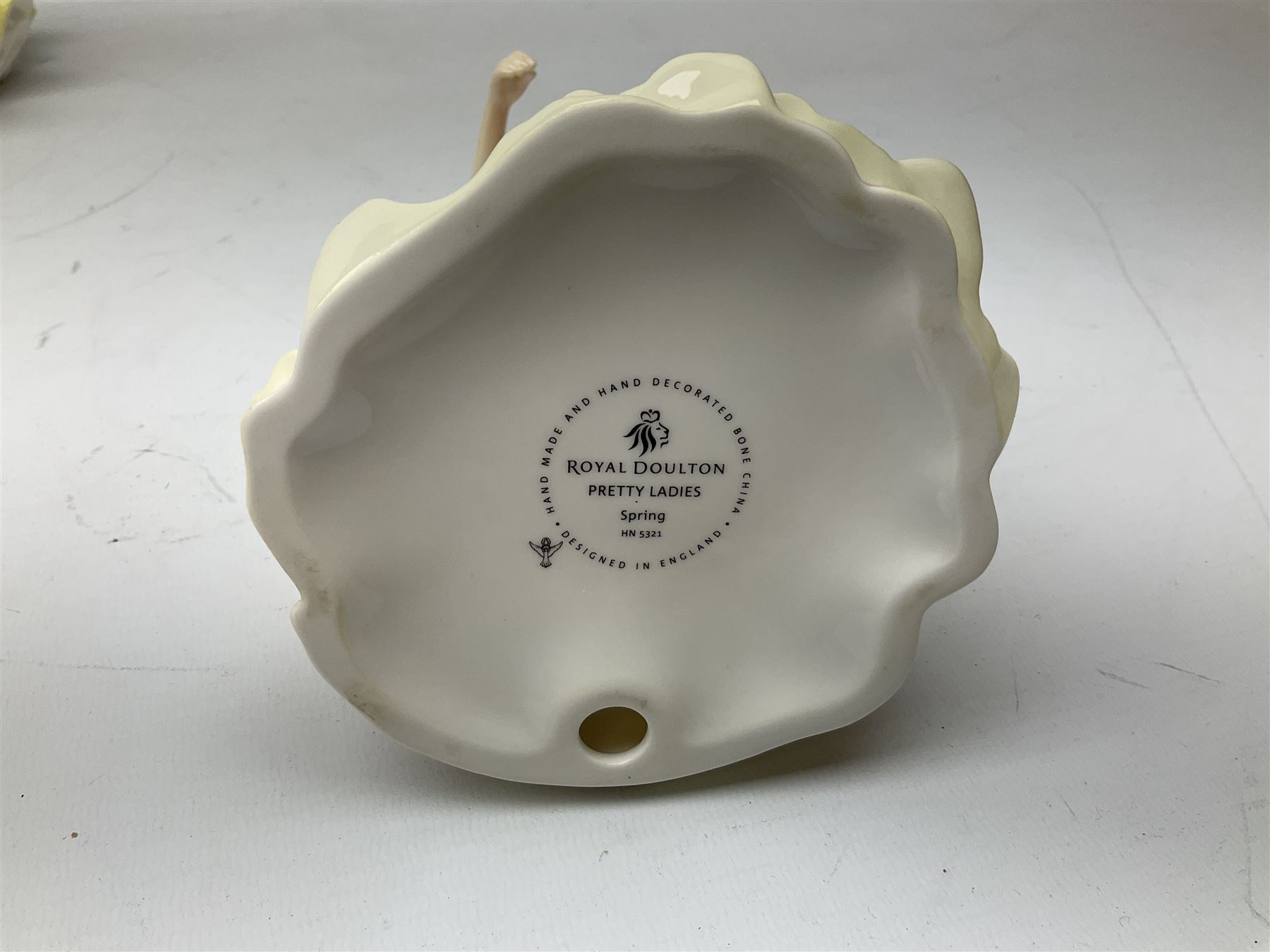 Five Royal Doulton figures from the Pretty Ladies collection, comprising Spring Ball HN5467, Autumn Ball 5465, Summer Ball HN5464, Summer HN5322 and Spring HN5321