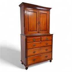 George III oak and mahogany banded house keeper's press cupboard, projecting cornice over figured mahogany frieze with Tunbridge ware pattern bands, two panelled doors enclosing shelves, fitted with two short over three long drawers, flanked by reeded columns throughout, on turned feet
