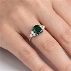 18ct gold green tourmaline and diamond ring, single octagonal cut tourmaline of approx 2.15 carat, with three round brilliant cut diamonds set either side, total diamond weight approx 0.30 carat