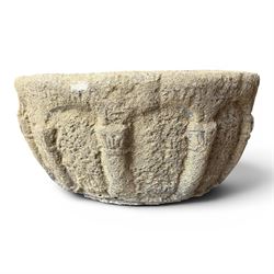 Large cast stone ecclesiastical style urn in the style of a baptismal font, featuring a ha...